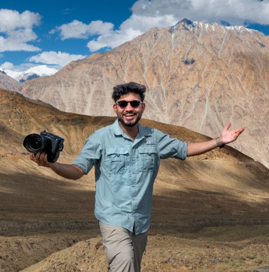 Trikansh Sharma photographing in the mountains of Ladakh